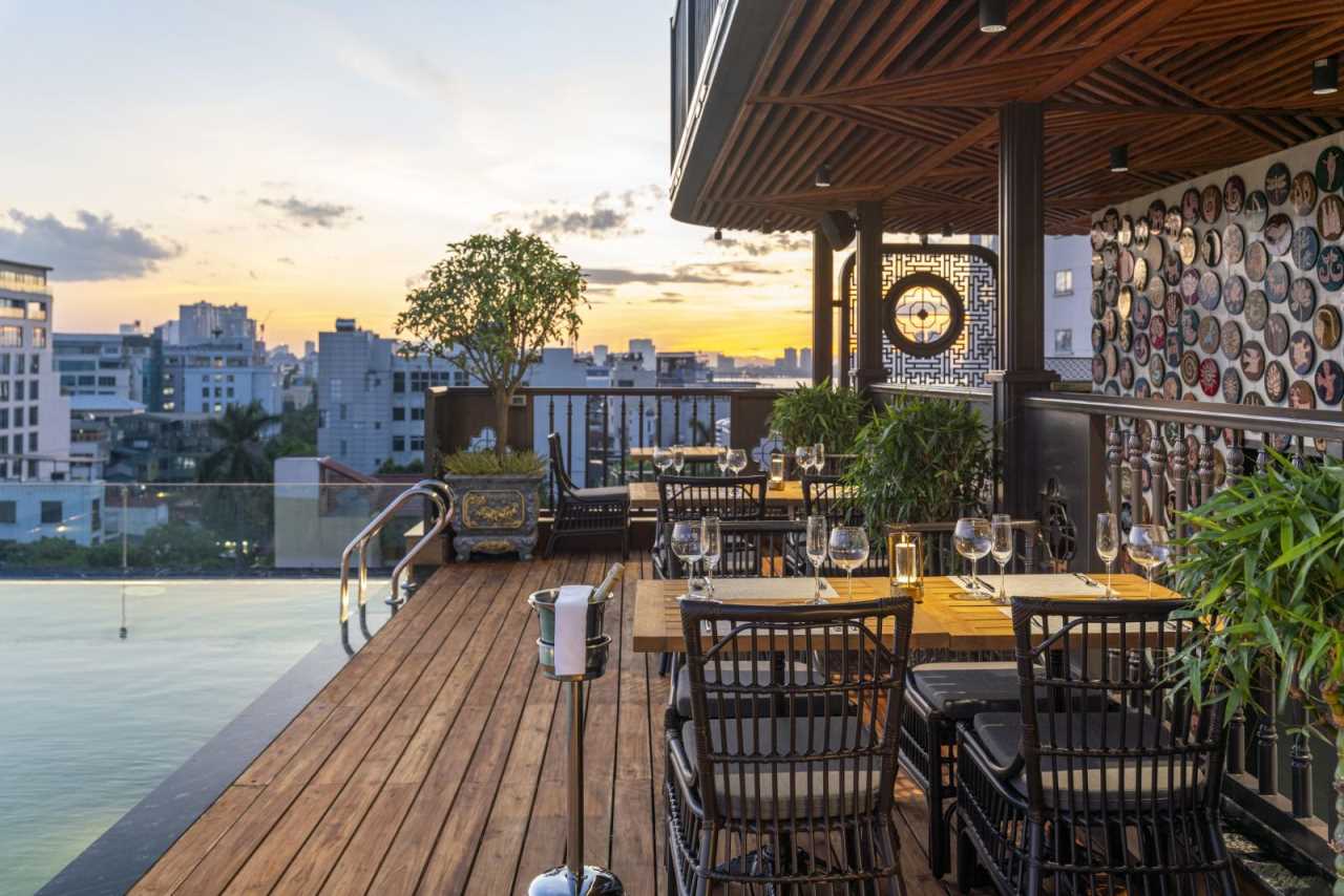 Nón Skybar invites you to savor a handcrafted cocktail while taking in the sparkling cityscape